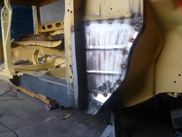 remise en place de la tôle de fermeture